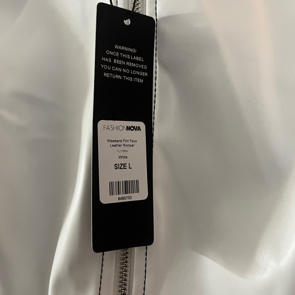 Fashion Nova White faux leather jump suit .